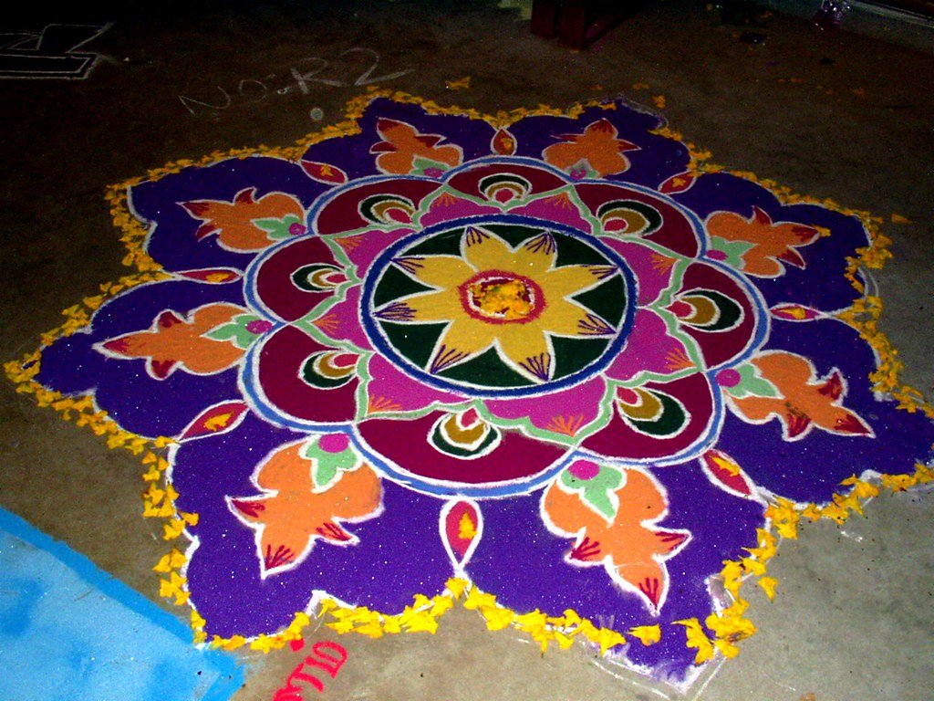 a big Flower-Based Rangoli