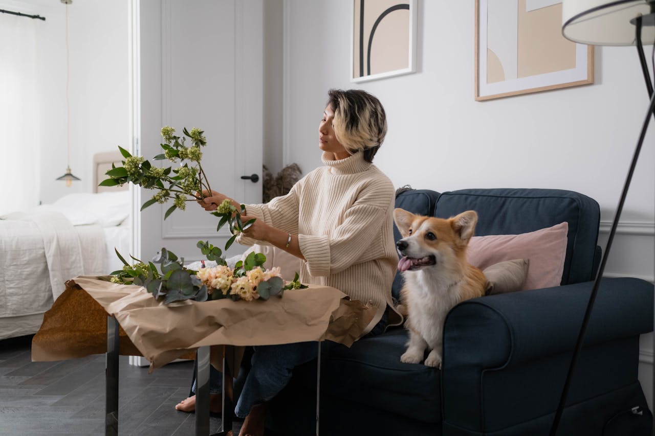 woman arranging flower decoration
